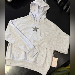 NWT. Woman’s Since Forever Gray Hoodie with grey camo Star Design. Size S